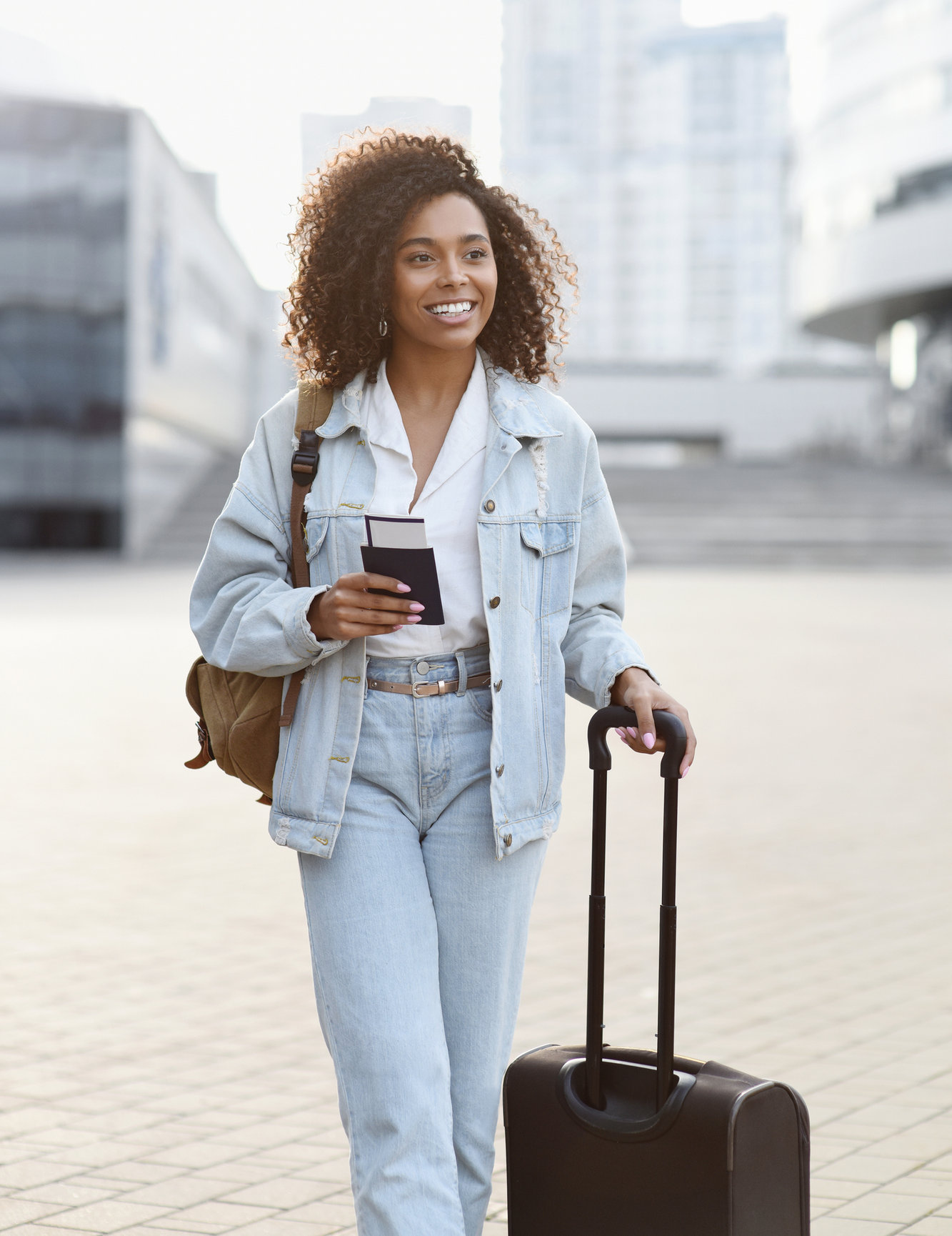 International traveler with luggage preparing for a trip
