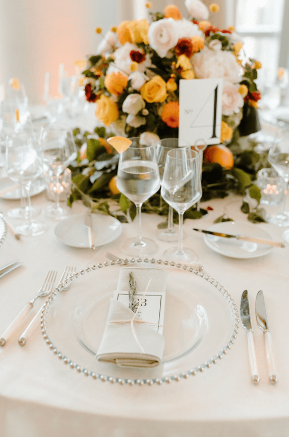 five star review from previous wedding client. Photo of elegant table setting in private venue in Hudson Yards New York