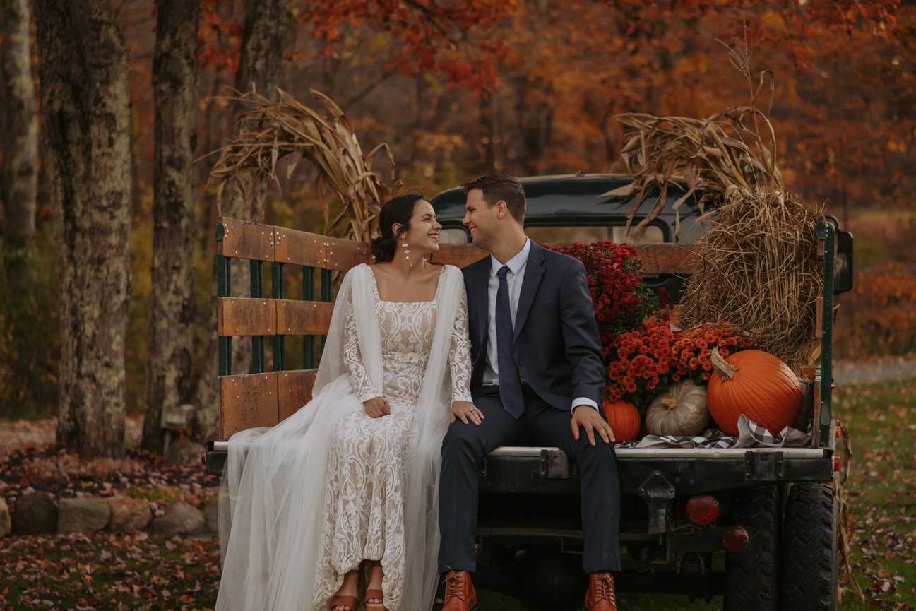 Bride and Groom on Truck at Countryside Wedding in Connecticut